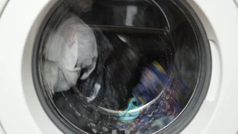 Laundry in the washing machine Stock Footage 185025471