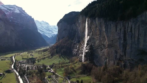 Lauterbrunnen fall really close approach, long travelling - Aerial 4K Stock Footage 220897702