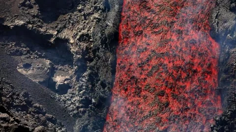 Lava Flow flowing detail on Etna volcano Stock Footage 312703329