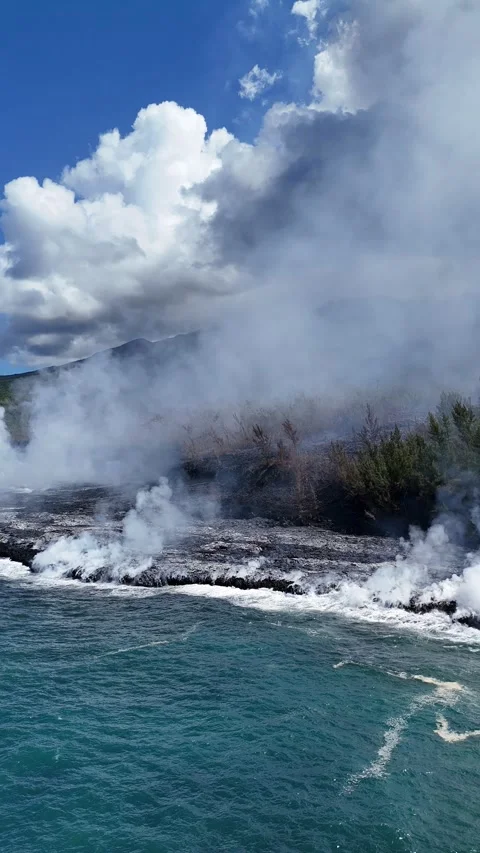 Lava Flow Meets the Ocean and Creates New Land, Reunion island - 20 Mar 2026 Stock Footage 339027142
