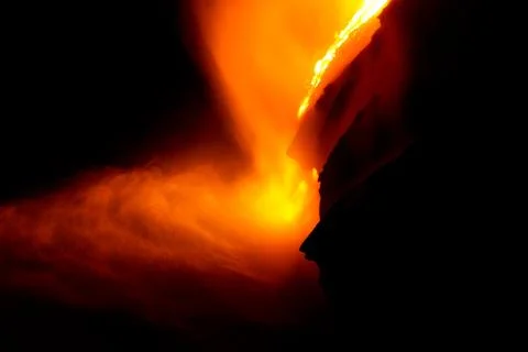 Lava flow at night Foto stock
