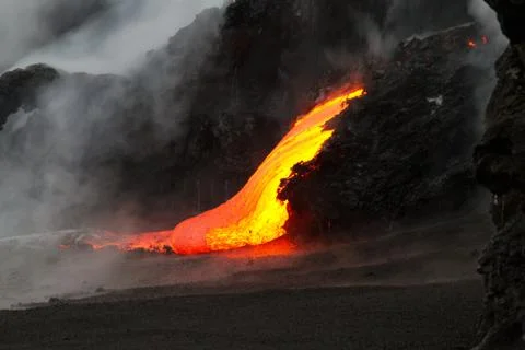 Lava flow at night Foto stock