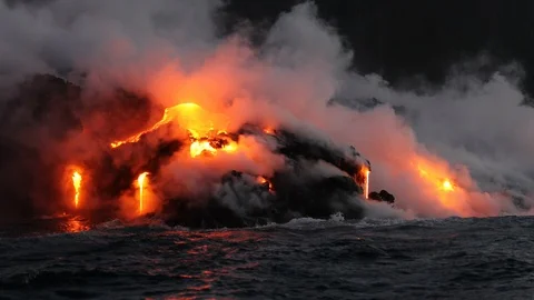 Lava flowing into the ocean from volcano lava eruption on Big Island Hawaii Stock-Footage 101117732