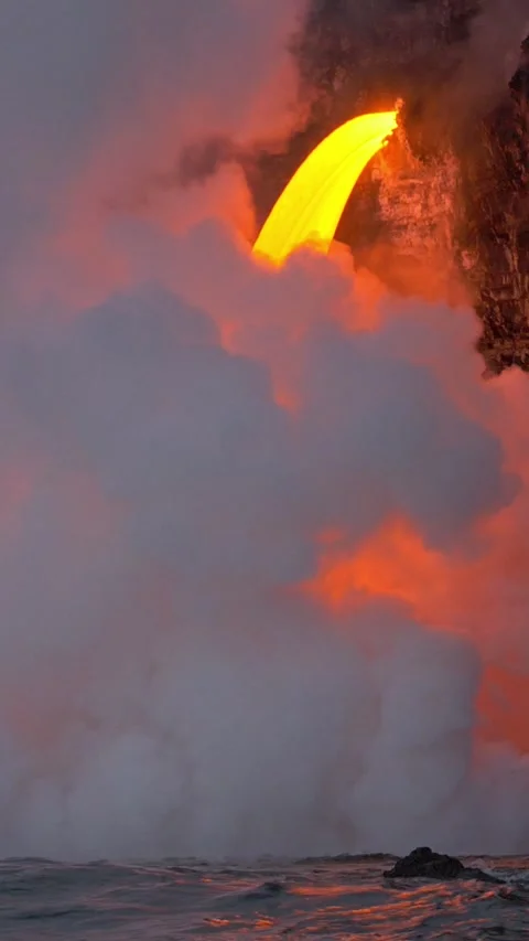 Lava Flows Into The Ocean. Vertical Video. Video stock 336004950