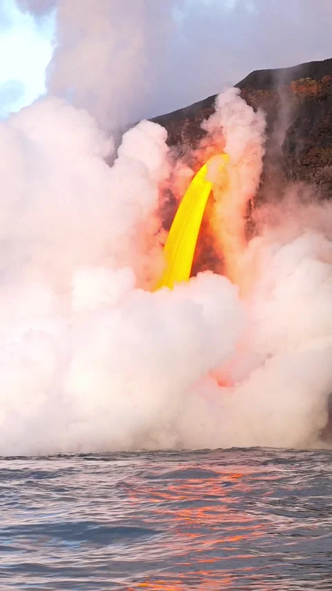 Lava Flows Into The Ocean. Vertical Video. Stock-Footage 336004962