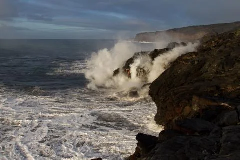 Lava flows into the sea Stock-Fotos