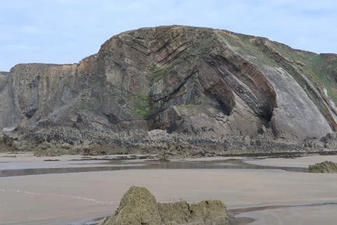 Lava formation in the cliffs at Bude Beach. Stock Photos