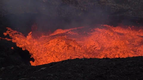 Lava Lake Erupting and Spilling Molten L... | Stock Video | Pond5