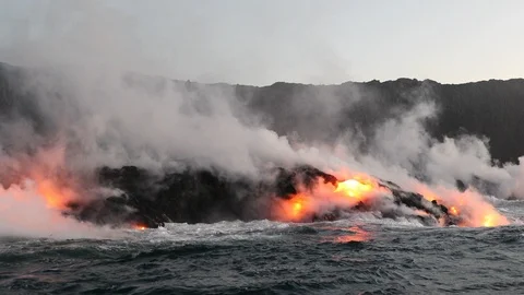Lava ocean - flowing lava reaching ocean on Big Island, Hawaii volcano eruption Stock-Footage 101117384