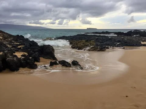 Lava rocks on the beach Stock Photos