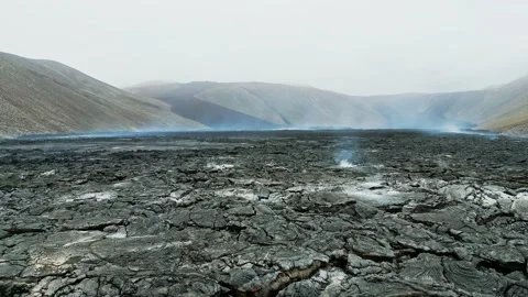 Lava rocks still cooling down near Geldingadalir active Volcano from Stock Footage 233034749