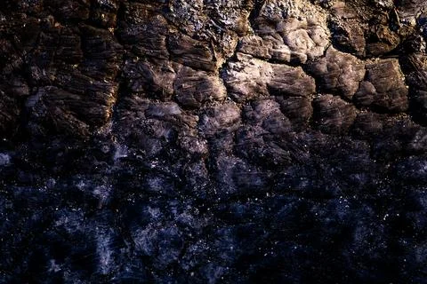 Lava volcanic texture with rough surface. Lava macro closeup with crack det.. Stock Photos