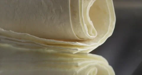 Lavash falls on a mirror surface in slow motion Stock Footage 198146617