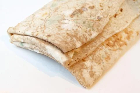 Lavash leaf isolate with mold on a white background. Spoiled product. Stock Photos