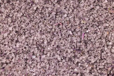 Lavender bath salt crystals creating textured background Stock Photos