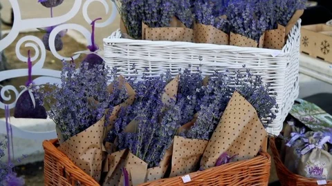 Lavender bouquets in wicker baskets at the fair Stock Footage 79097523