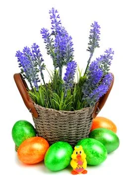 Lavender with easter eggs and chiken in the basket Stock Photos