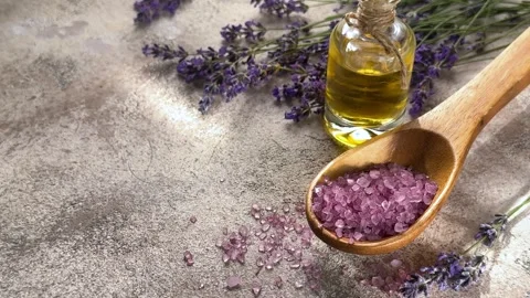 Lavender essential oil with bath salt for spa aromatherapy Stock-Footage 340265874