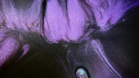 Lavender Ink Curtains Flowing Over Black Liquid With Spark Particles Stock Footage 346604742
