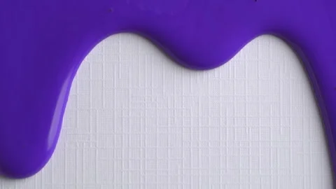 Lavender liquid drops of paint flow down on white paper. Macro photo. Purpl.. Stock Footage 262533712