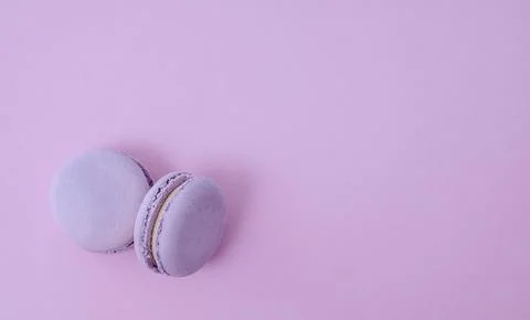 Lavender macarons on lilac flat lay background, colorful french dessert and.. Stock Photos