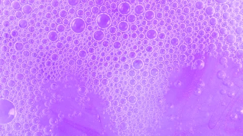 Lavender shower gel with bubbles, SPA background. Shampoo bubbles rotating... Stock Footage 276411233