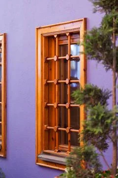 Lavender wall with window Stock Photos