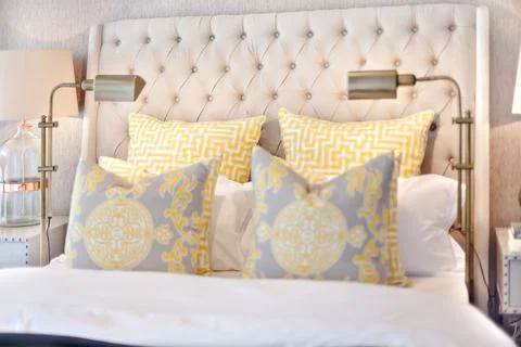 Lavish Bed with Quilted Back Stock Photos