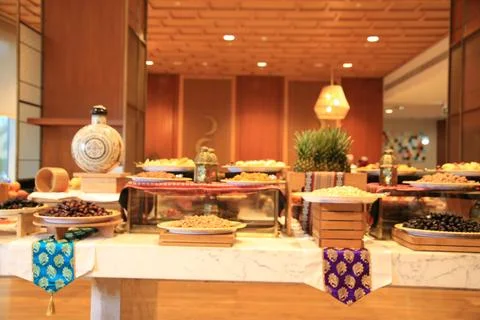 A lavish buffet spread featuring an array of colourfu dishes, elegantly arranged Stock Photos