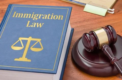 A law book with a gavel - Immigration law Stock Photos