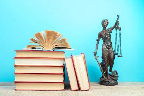 Law concept - Open law book scales, Themis statue on table in a courtroom o.. Stock Photos