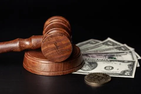 Law mallet and a stack of money Stock Photos