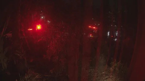The Law outside Apt in Rain at Night Video stock 101438870