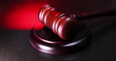 Law theme. Court of law trial in session. Judge gavel on wooden table in lawyer Stock Footage