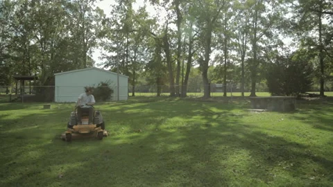Lawn care tips for maintaining your green grass in the yard Stock Footage 327957351