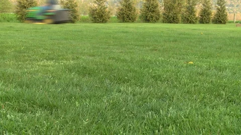 Lawn Cutting with Tractor Time Lapse Stock-Footage 4676995