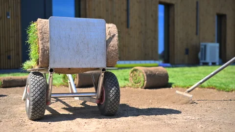 Lawn Installation Using Sod Rolls Stock Footage 276692003