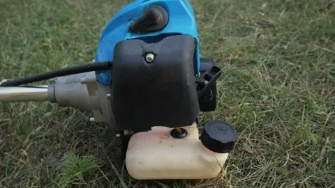 Lawn mower and its working parts. Components of the weed mowing tool Stock Footage 188782479