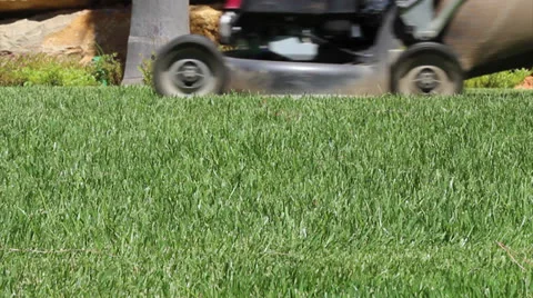 Lawn mower cutting the grass FG Stock Footage 26986479