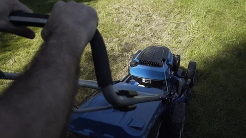 Lawn mower cutting the grass Stock Footage 111397029