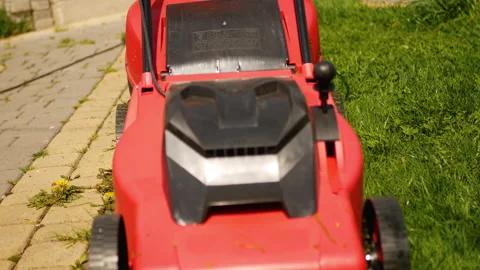 Lawn mower on green grass Stock Footage 201472488