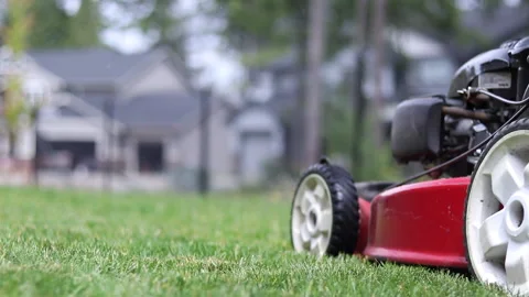 Lawn Mower Ground Level Tracking Shot Stock Footage 135080466