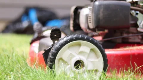 Lawn Mower Low Angle Tracking Shot Stock Footage 135081719