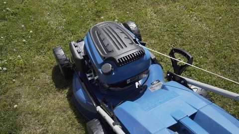 Lawn Mower Top view -moving across the lawn Stock Footage 111396516