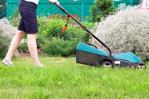 Lawn Mower at Work Stock Photos