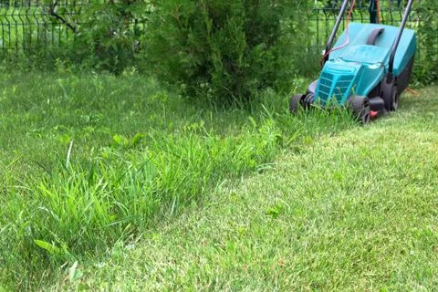 Lawn Mower at Work Stock Photos