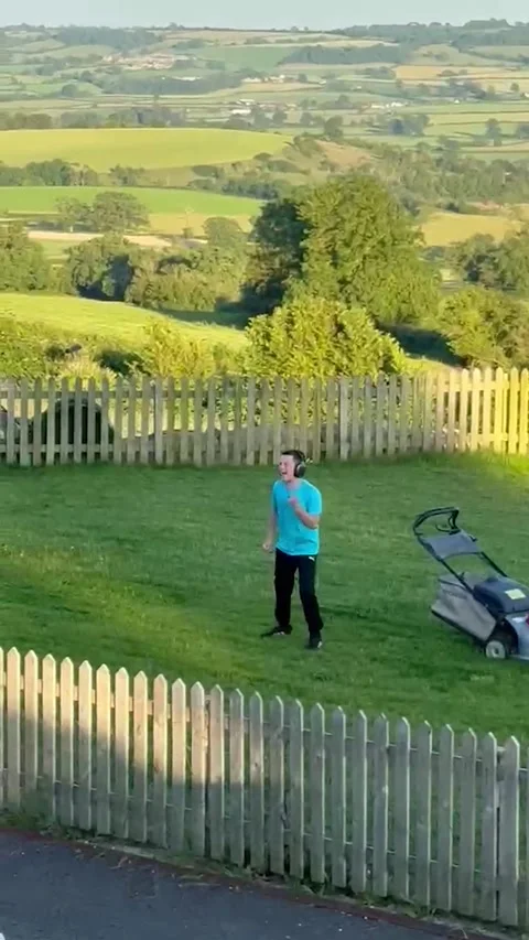 Lawn Mowing and Michael Jackson Moves, Bristol, UK - 29 Jun 2026 Stock Footage 339030269
