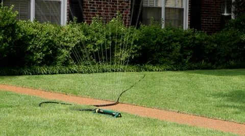Lawn Sprinkler Stock-Footage 8516281