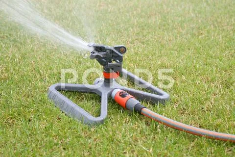 Lawn sprinkler Stock Photos