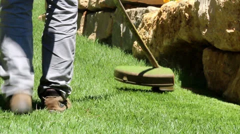 Lawn string trimmer cutting border B1 Stock Footage 26994250